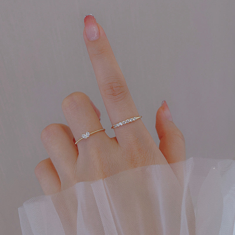 Anillos de diamantes de Heart Row de metal al por mayor